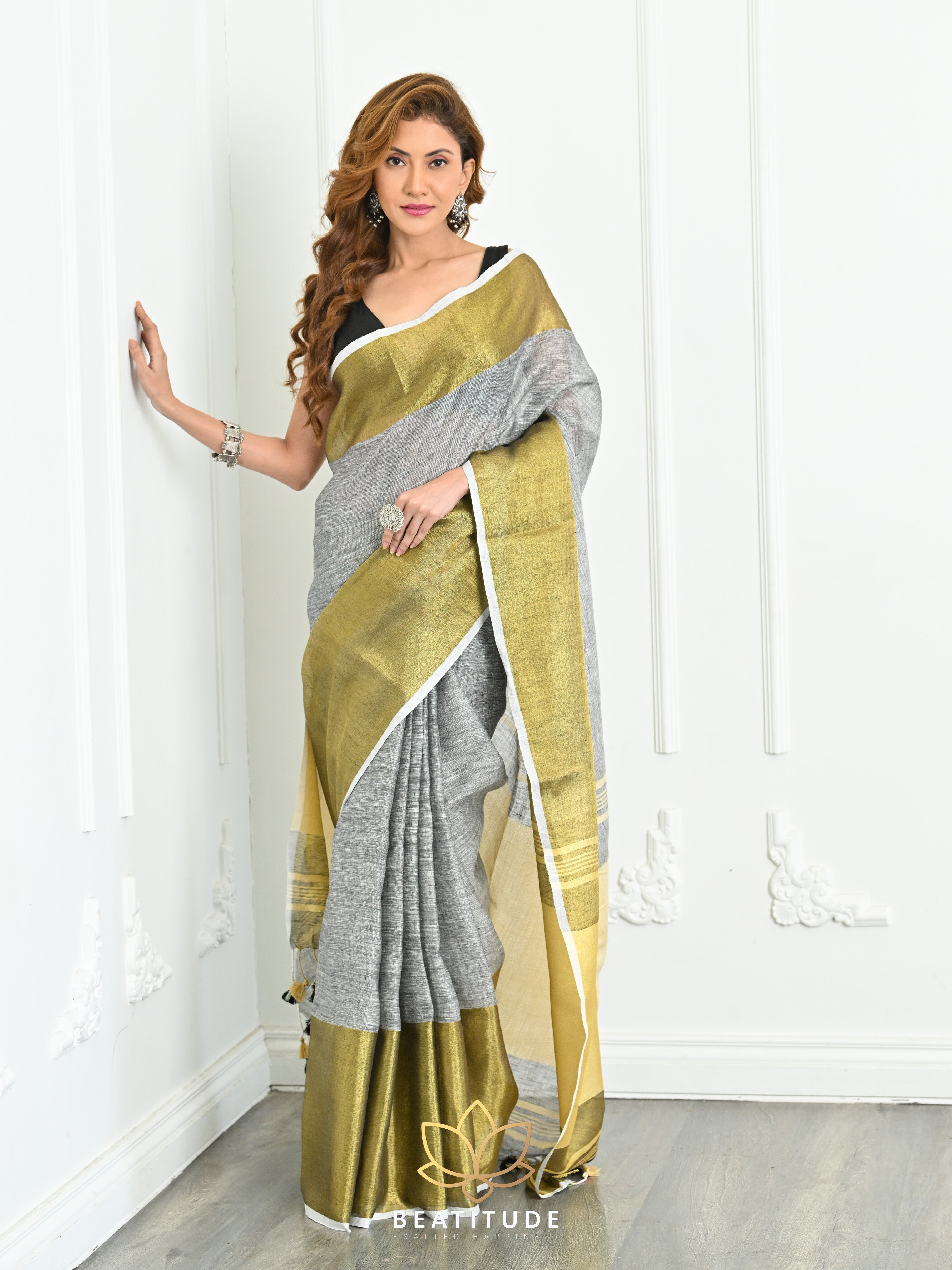 Golden and Cream color linen sarees with all over weaving buties saree  design -LINS0001873